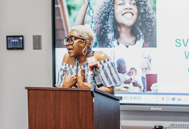 Tracye sharing her story at a St. Vincent de Paul event