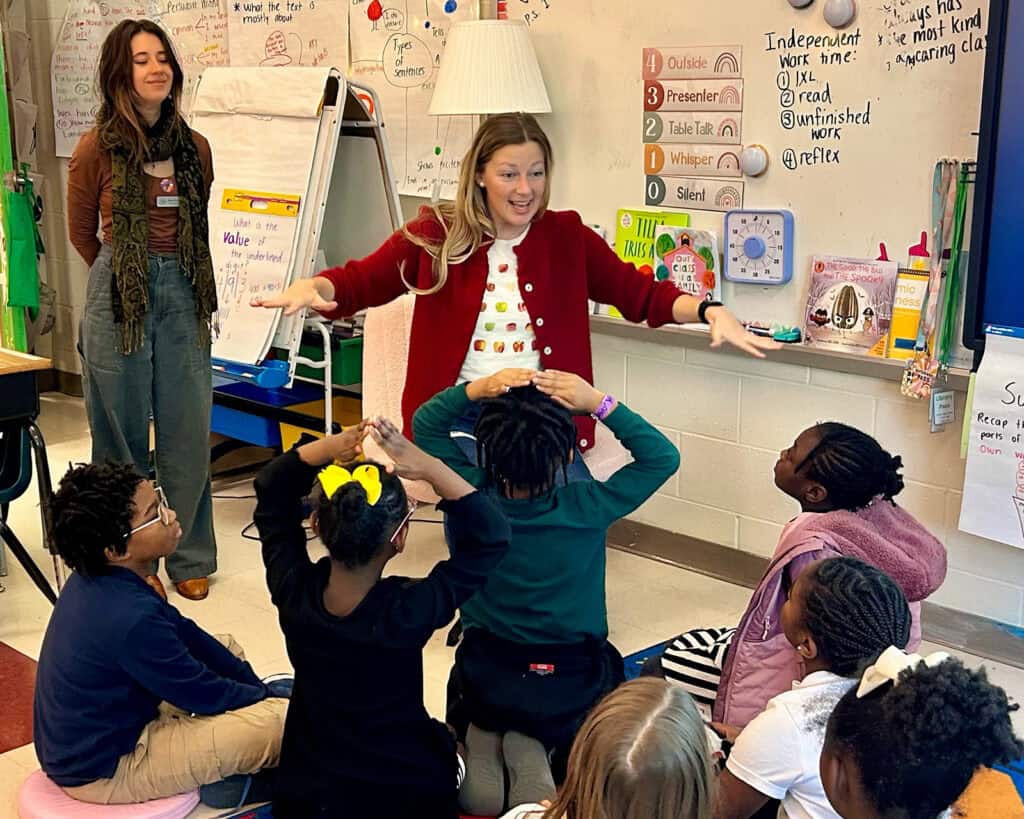 Students facing food insecurity learn about fresh vegetables and farming before they visit the free produce market. 